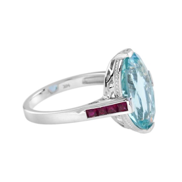 6.34ct Aquamarine Solitaire Ring with Ruby Shoulders