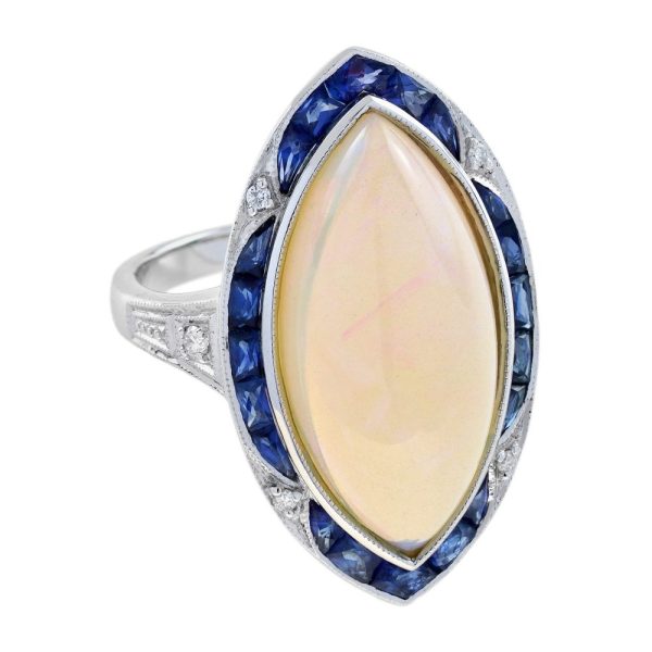 6.55ct Marquise Opal with Sapphire and Diamond Cluster Navette Ring