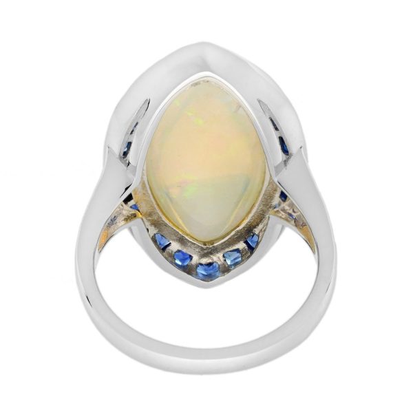 6.55ct Marquise Opal with Sapphire and Diamond Cluster Navette Ring