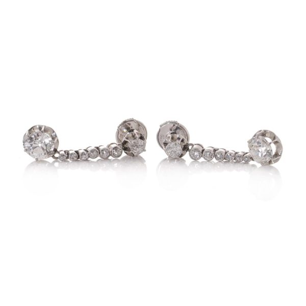 Antique diamond drop earrings set in platinum.