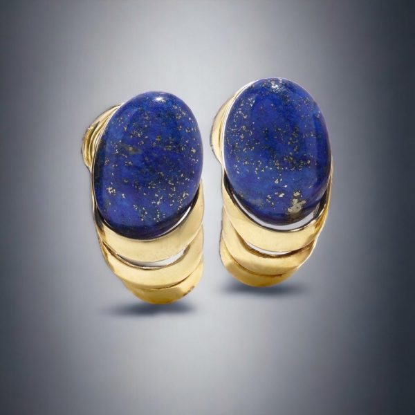 Vintage gold clip-on stud earrings with lapis lazuli stones.
