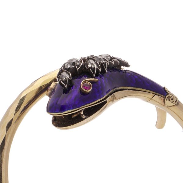 Gold and silver snake serpent bangle with diamonds.