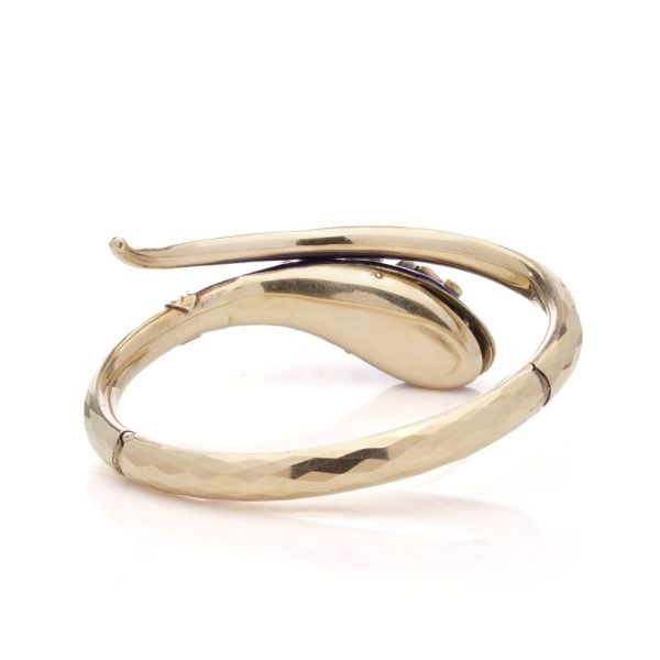 Gold and silver snake serpent bangle with diamonds.