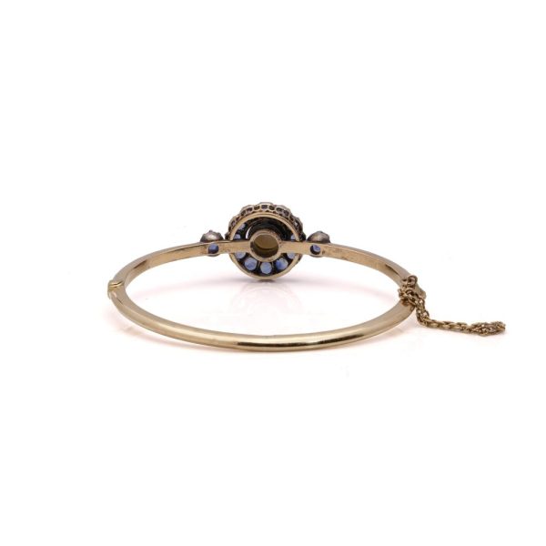 Victorian gold and silver sapphire cluster bangle with natural pearl.