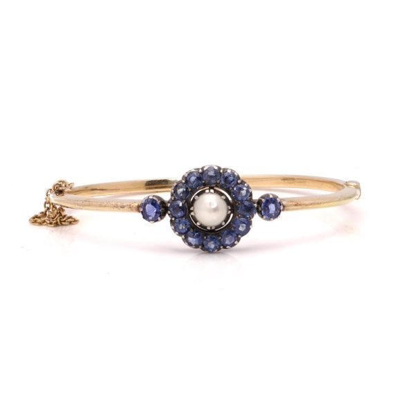 Victorian gold and silver sapphire cluster bangle with natural pearl.
