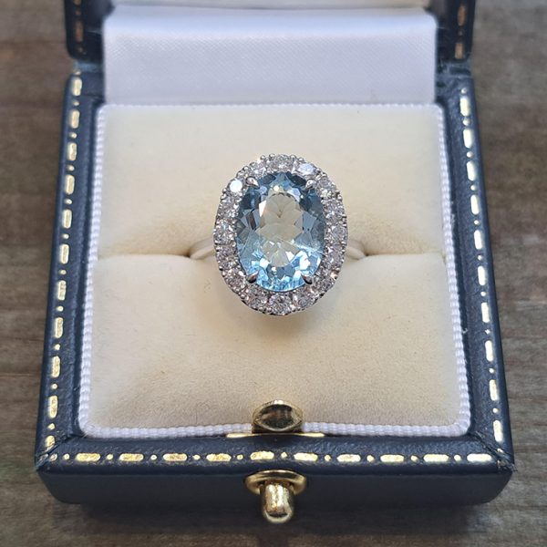 3.39ct Oval Aquamarine and Diamond Halo Cluster Engagement Ring in 18ct white gold
