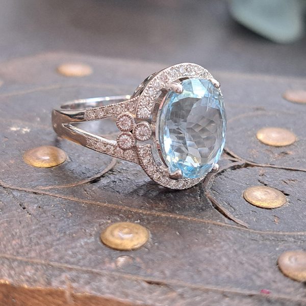 4.63ct Oval Aquamarine and Diamond Cluster Dress Ring with split shoulders