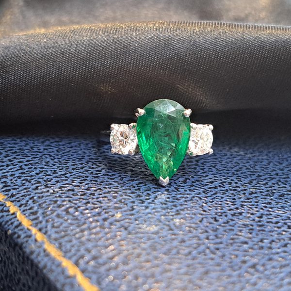 3.69ct Pear Cut Emerald and Diamond Trilogy Three Stone Engagement Ring