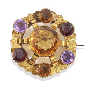 Victorian brooch with citrine, amethyst and garnet in gold circa 1880.