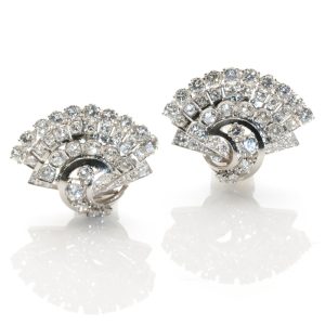 Vintage fan platinum clip earrings set with brilliant cut diamonds 3.60 carats circa 1930's. 