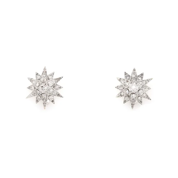Victorian star diamond earrings set on silver and gold.