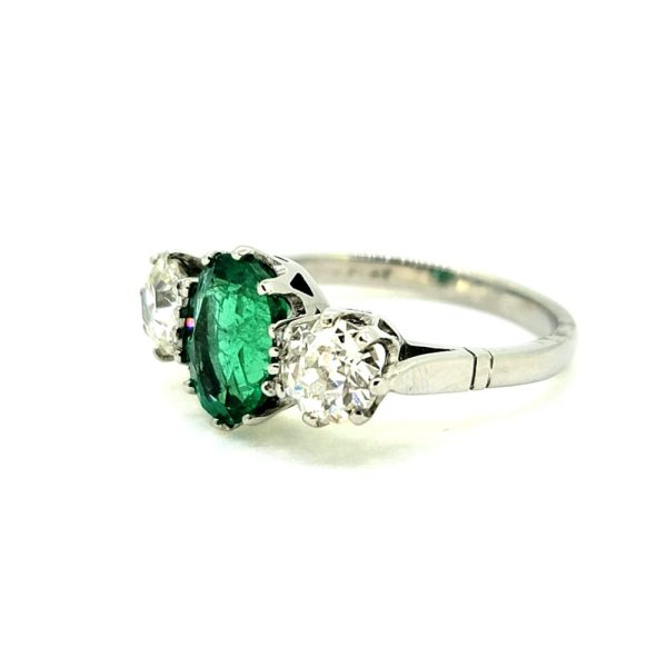 2ct Oval Emerald and Diamond Three Stone Engagement Ring in Platinum