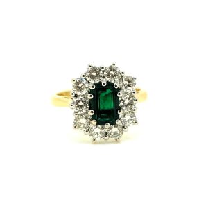 0.50ct Emerald Cut Emerald and 1ct Diamond Floral Cluster Ring