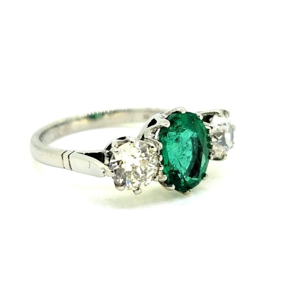 2ct Oval Emerald and Diamond Three Stone Engagement Ring in Platinum