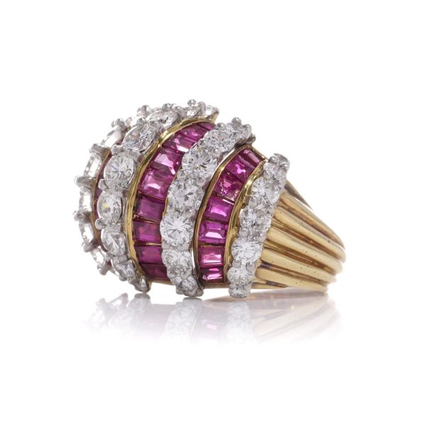 Vintage gold dome ring set with diamonds and rubies.