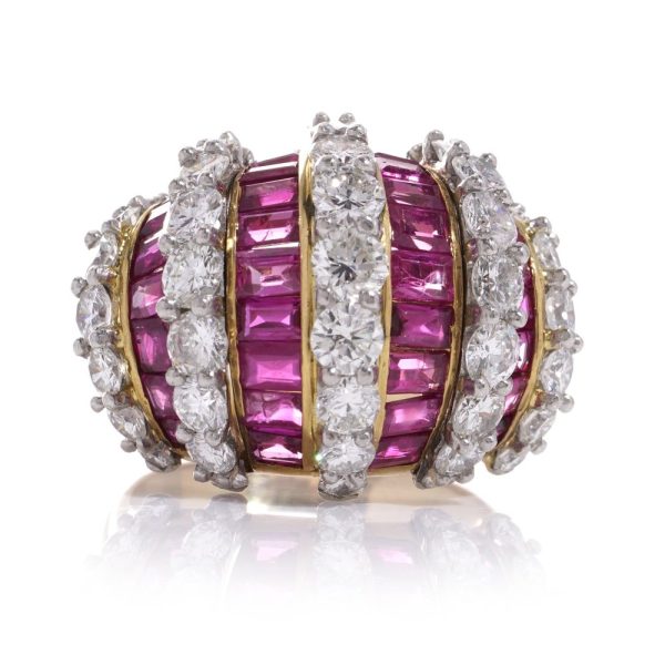 Vintage gold dome ring set with diamonds and rubies.