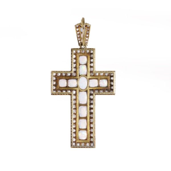Antique 20 gold cross pendant set with diamonds and opals.