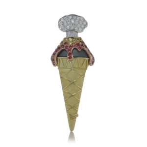 Theo Fennell gold gelato brooch set with diamonds and sapphires.