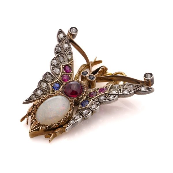 Victorian gold and silver butterfly brooch with gemstones.