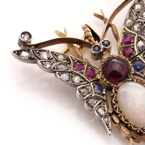 Victorian gold and silver butterfly brooch with gemstones.