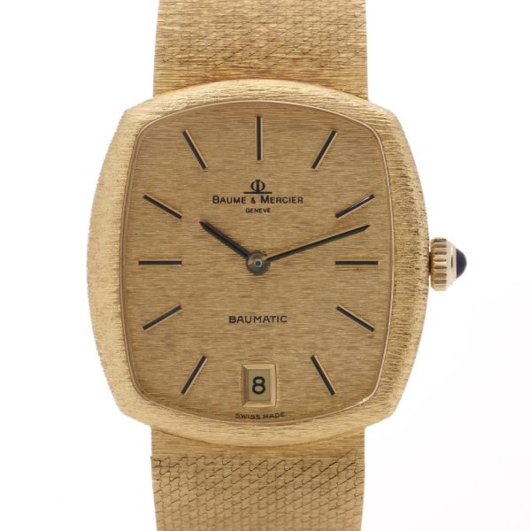 Vintage Baume et Mercier Baumatic 37082 Solid 18ct Yellow Gold Automatic Watch with champagne dial with date. Circa 1977