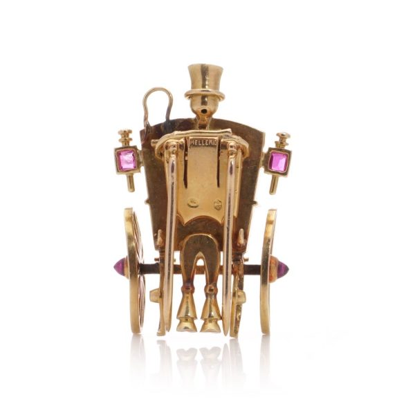 Mellerio gold sapphire and ruby carriage