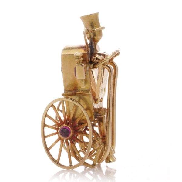 Mellerio gold sapphire and ruby carriage