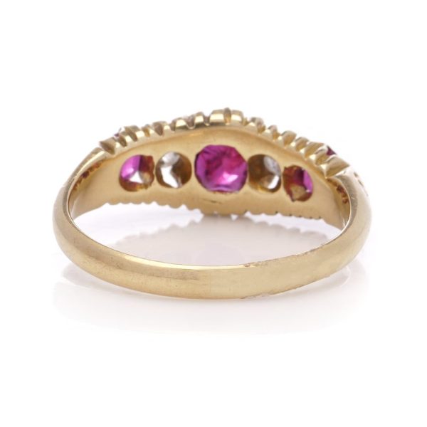 Antique gold five-stone ruby and diamond ring.