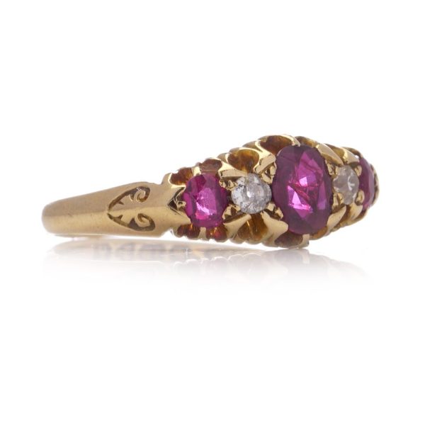 Antique gold five-stone ruby and diamond ring.