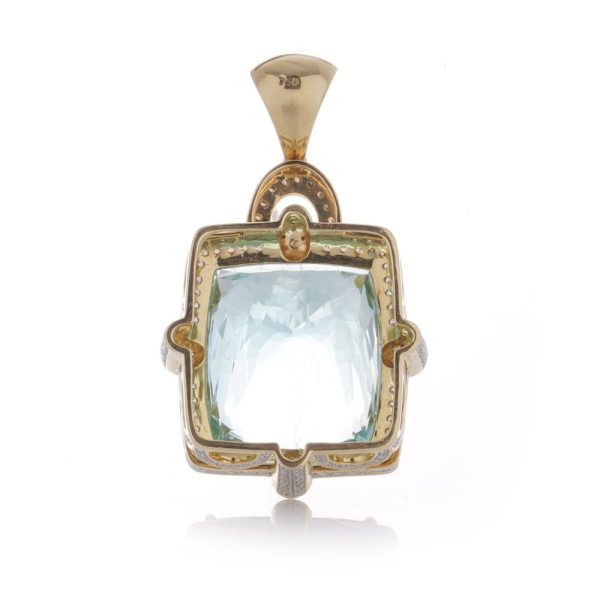 Gold pendant with aquamarine and diamonds.