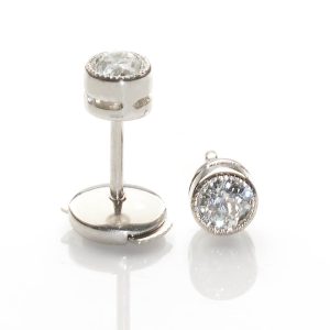 Diamond stud earrings in platinum.