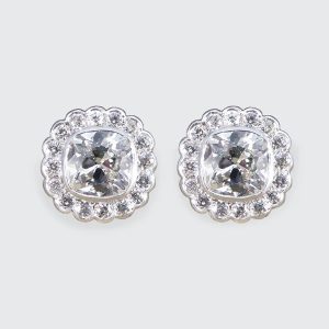 Diamond daisy cluster stud earrings in platinum.