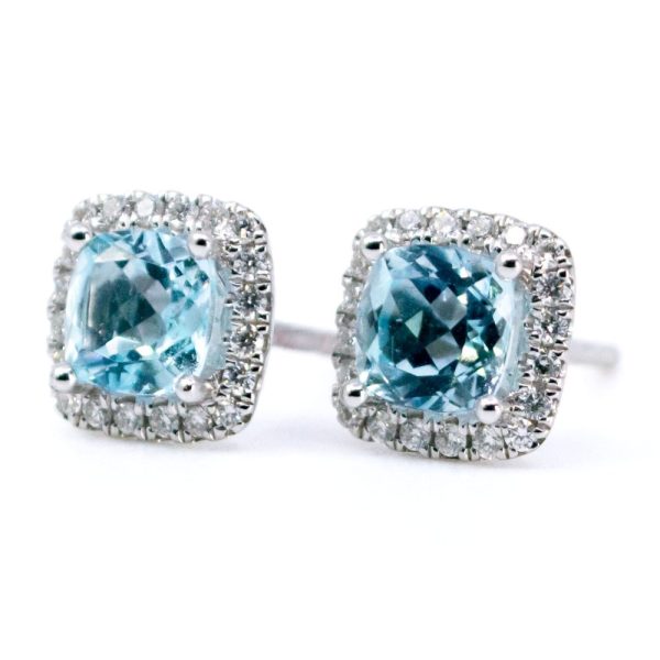 Topaz and diamond stud earrings in white gold.