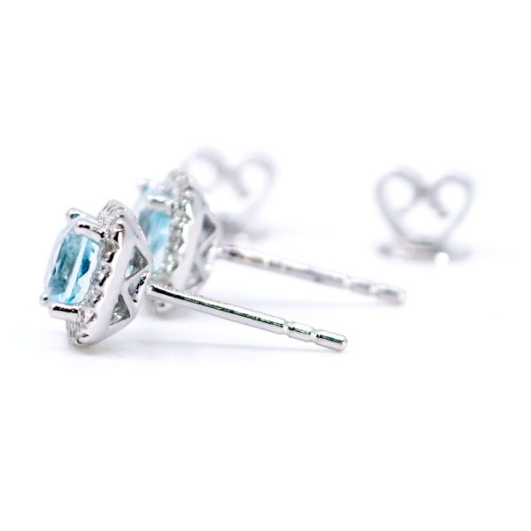 Topaz and diamond stud earrings in white gold.