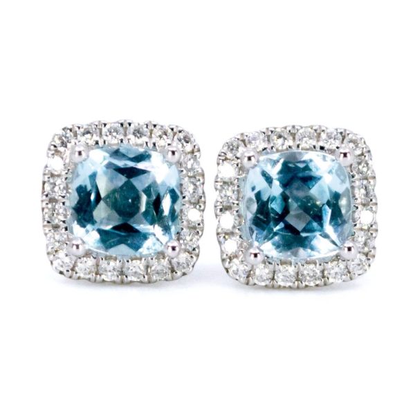 Topaz and diamond stud earrings in white gold.