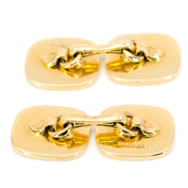 Tiffany & Co. gold bridge link cufflinks.