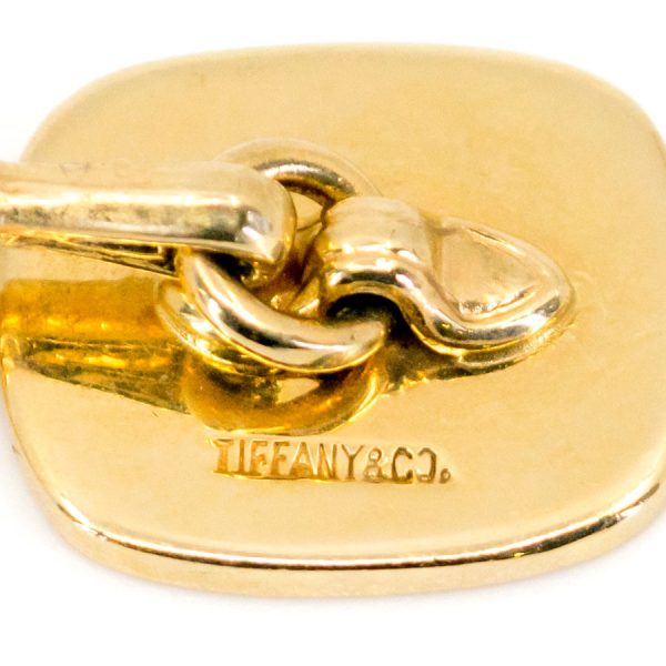 Tiffany & Co. gold bridge link cufflinks.