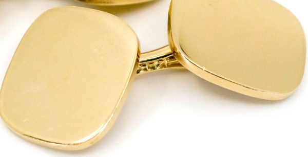 Tiffany & Co. gold bridge link cufflinks.