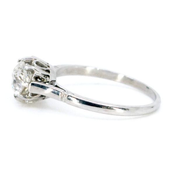 Vintage old mine cut diamond engagement ring in platinum.