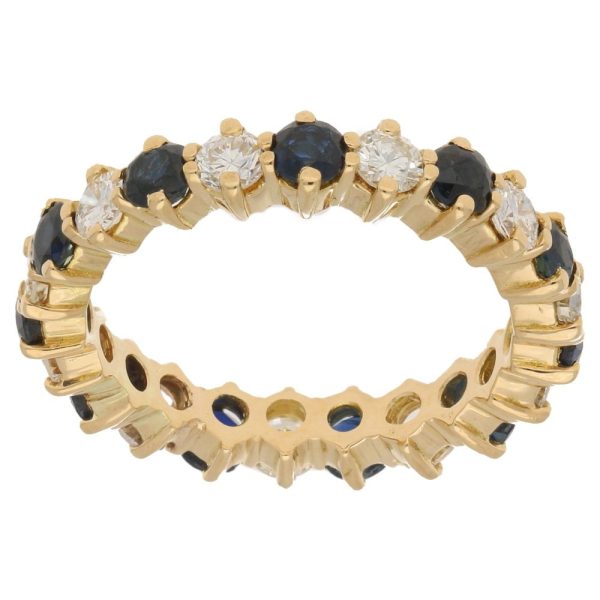 Sapphire and diamond full eternity gold ring.