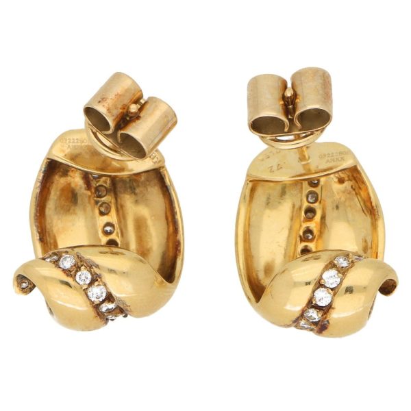 Vintage Boodles diamond leaf earrings in gold.