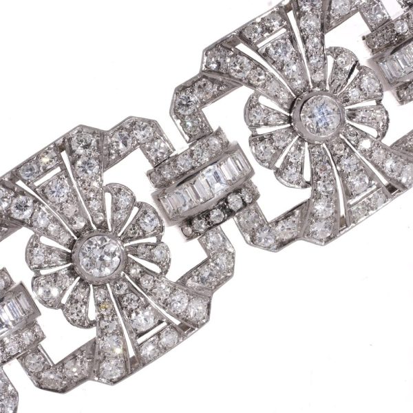 Platinum and diamond floral design link bracelet.