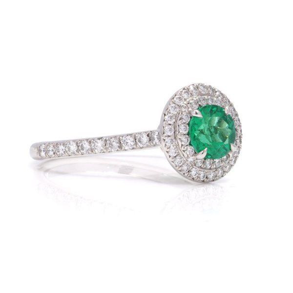 Tiffany & Co ladies emerald and diamond ring in platinum.