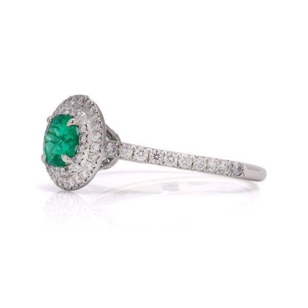 Tiffany & Co ladies emerald and diamond ring in platinum.