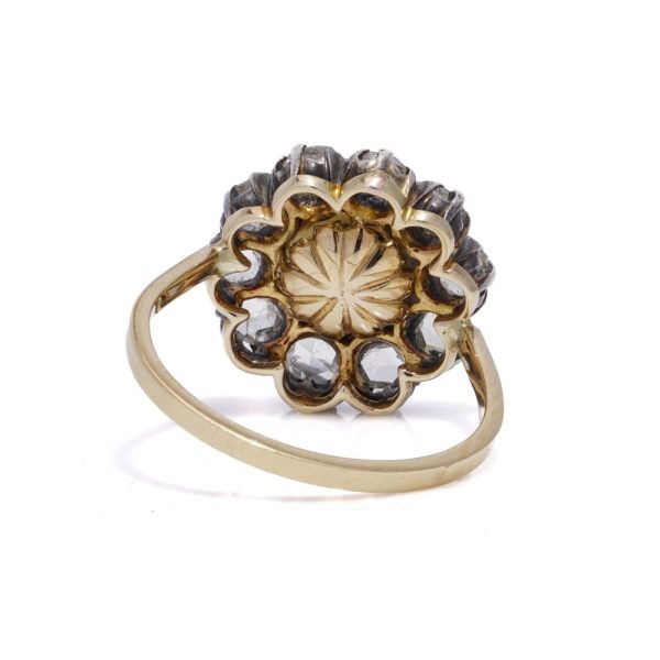 Victorian pearl and diamond cluster ring in gold and silver.