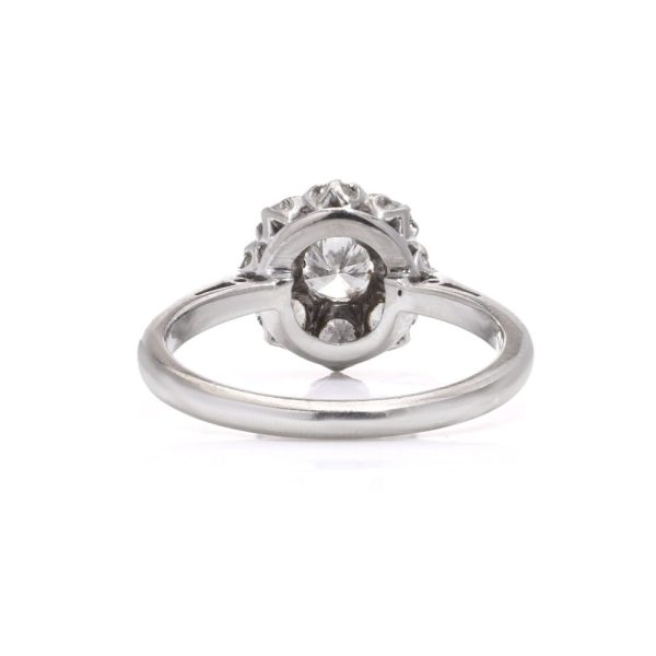 Vintage diamond cluster ring in white gold.