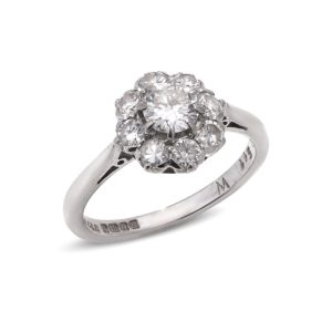 Vintage diamond cluster ring in white gold.