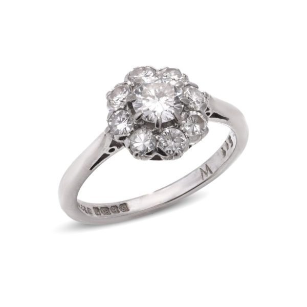 Vintage diamond cluster ring in white gold.