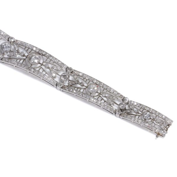 Antique platinum link bracelet with diamonds.