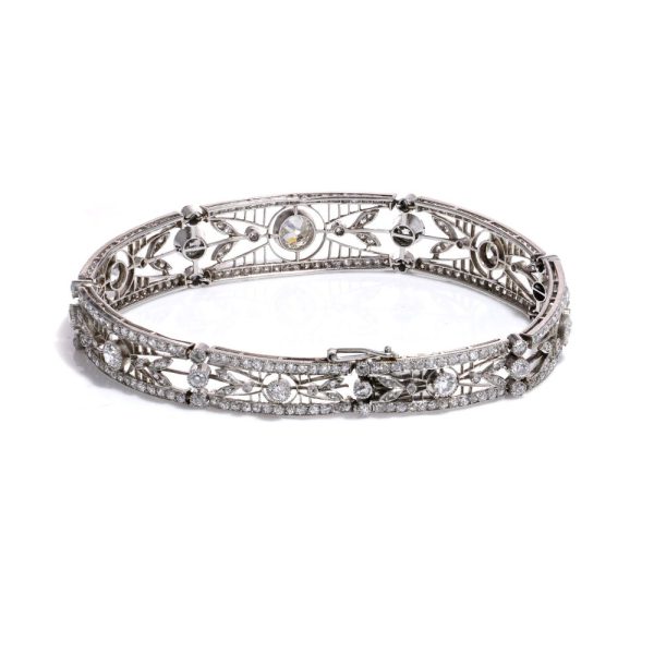 Antique platinum link bracelet with diamonds.